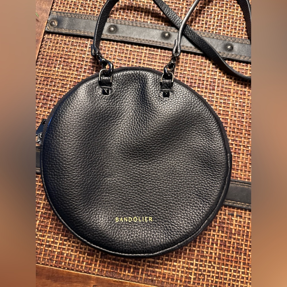 bandolier, round pouch, and strap.